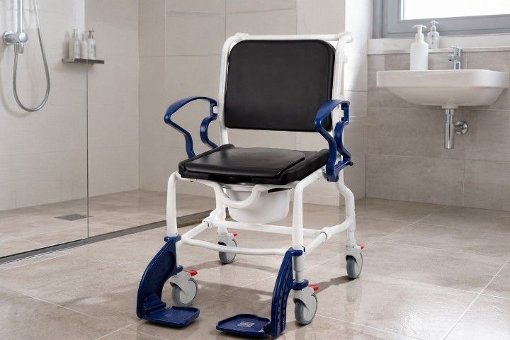 Rebotec Dusch- und Toilettenrollstuhl Manhattan, Grau-Feuerrot