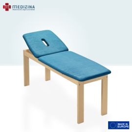 Abb. zeigt die Untersuchungsliege »Ranim 1« mit 2-tlg. Liegefläche, positiv verstellbarem Kopfteil und Nasenschlitz. Ausgestattet mit einem Holzgestell.