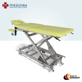 Abbildung zeigt Therapieliege SL 5-tlg. mit Comfort Gesichtsausschnitt, Spezial Kopfteil, Armablagen flex, Rundumschaltung und 6 cm Polsterung.  