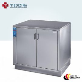 Abb. zeigt den Warmhalteschrank für Fango-Paraffin vom »FW 5070 N« mit doppeltüriger Ausführung. Ausgestattet mit 14 Einschüben, 10 Fangoblechen aus Aluminium, Umluftgebläse, und Temperaturregler (30–85 °C).